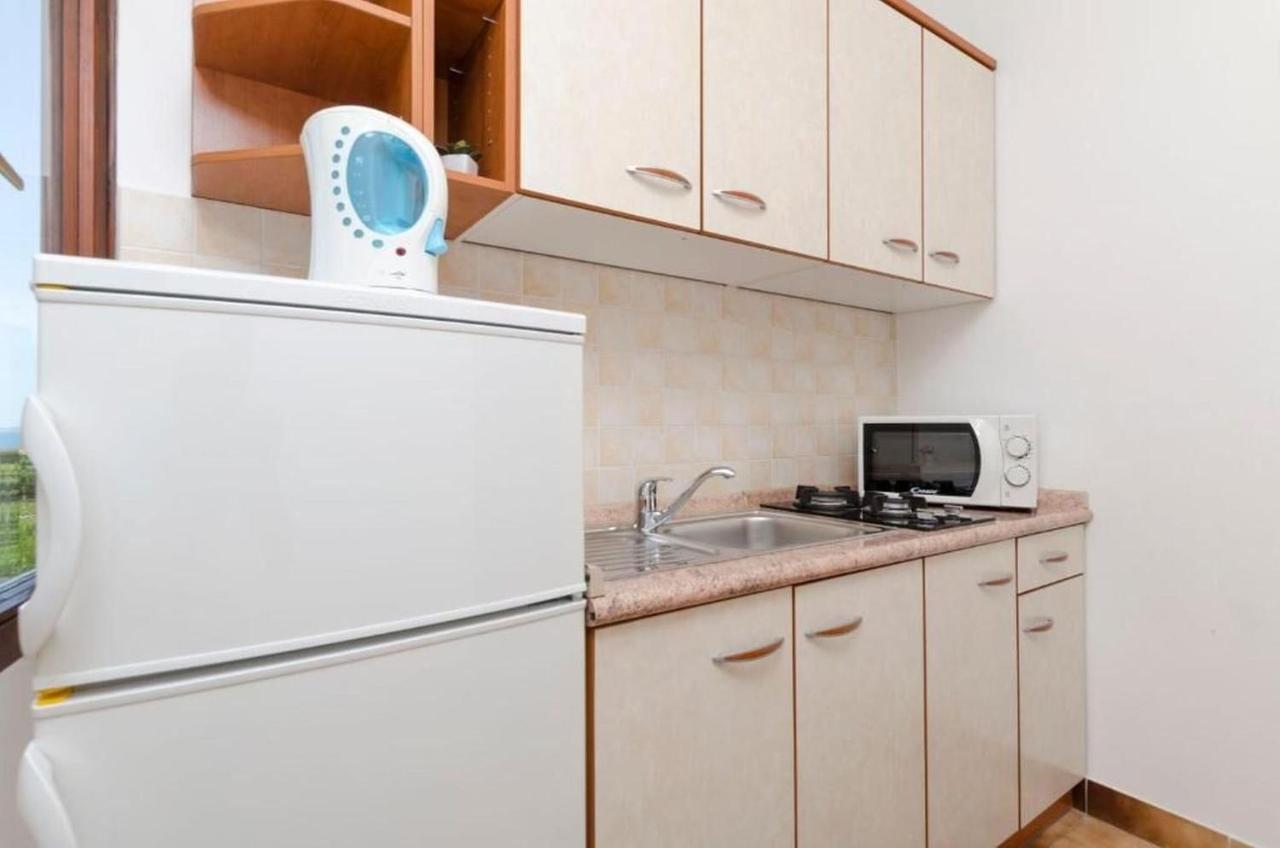 Apartments Spavalo Паг Экстерьер фото